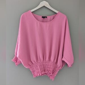 Beautiful light pink loose fit short sleeve blouse. Like New Medium